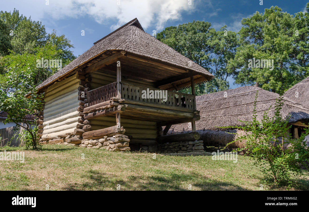 As the name says, it is a cottage that is part of the National Village Museum `Dimitrie Gusti` in Bucharest, a house that preserves the `old`, `histor Stock Photo